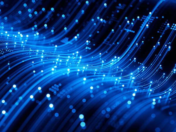 A swirl of bright blue lights with dots