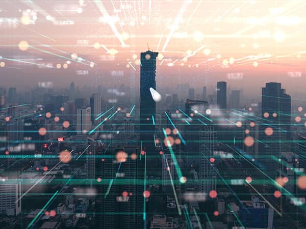 Business Network overview and locations Features 600x450 City skyline view with a grid of green lights
